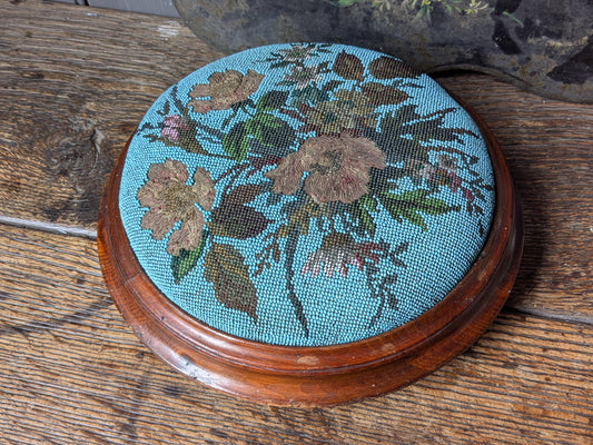 Antique footstool, beaded upholstered top